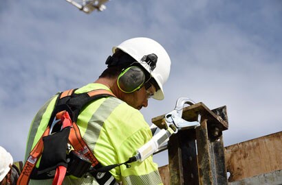 Workman outside on a sunny day