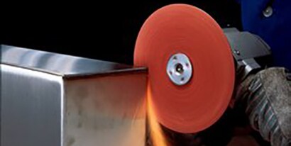 Weld grinding on stainless steel metal with 3M Cubitron II product
