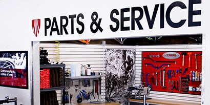 Exterior of auto parts store with 3M colored film wall wrap used for the store name and logo
