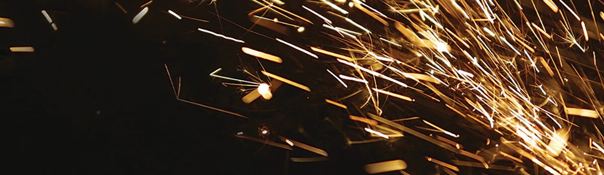 Sparks flying from grinding metal
