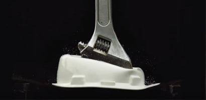 Adjustable wrench deeply embedded in hard hat after falling from height
