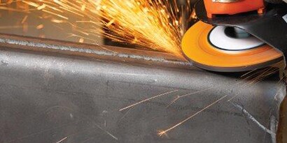 Weld grinding on mild carbon steel with 3M Cubitron II product
