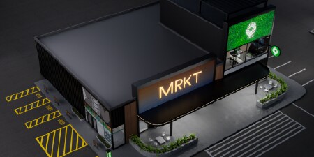Exterior moderno de la tienda con la marca MRKT, en el que se muestran las soluciones gráficas de 3M.

