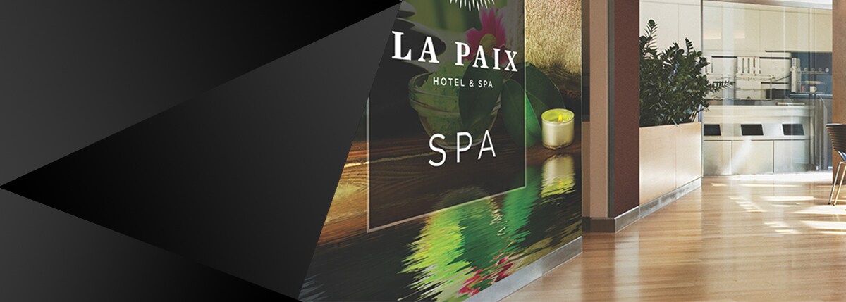 Spa lobby interior with a water and candle 3M wall wrap graphic
