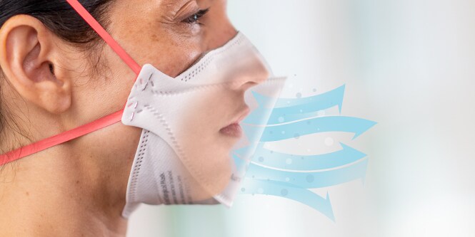 Illustration of air flowing through a filtering facepiece respirator
