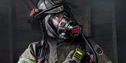 firefighter listening to his radio communciations
