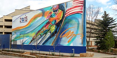 Billboard with a 3M overlaminate and protection film wall wrap of a colorful skier
