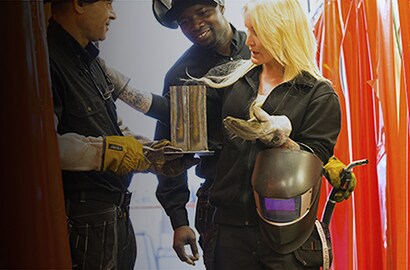 Jennie Hallestam, Welding Instructor, holding a Speedglas welding helmet