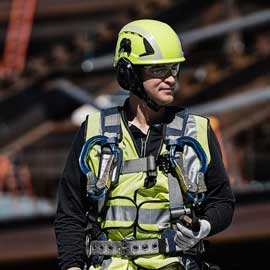 Worker wearing 3M safety PPE - including 3M™ SecureFit™ Safety Helmet X5000